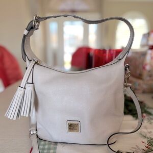 Dooney & Bourke white leather handbag with cross-body strap. Authentic!